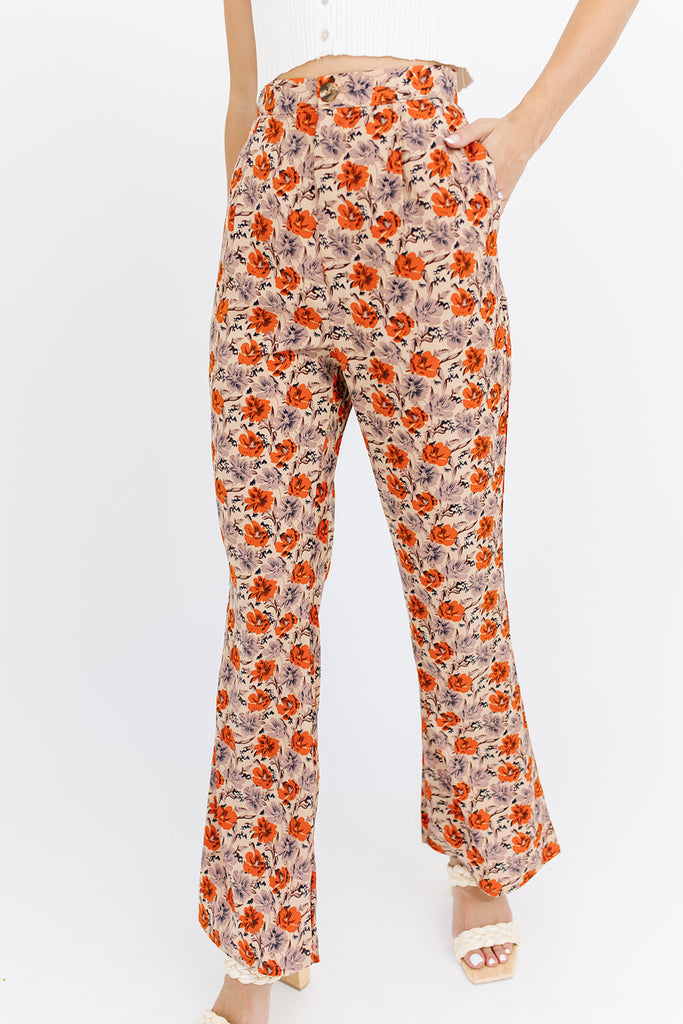 ASOS DESIGN retro floral flare trousers in orange